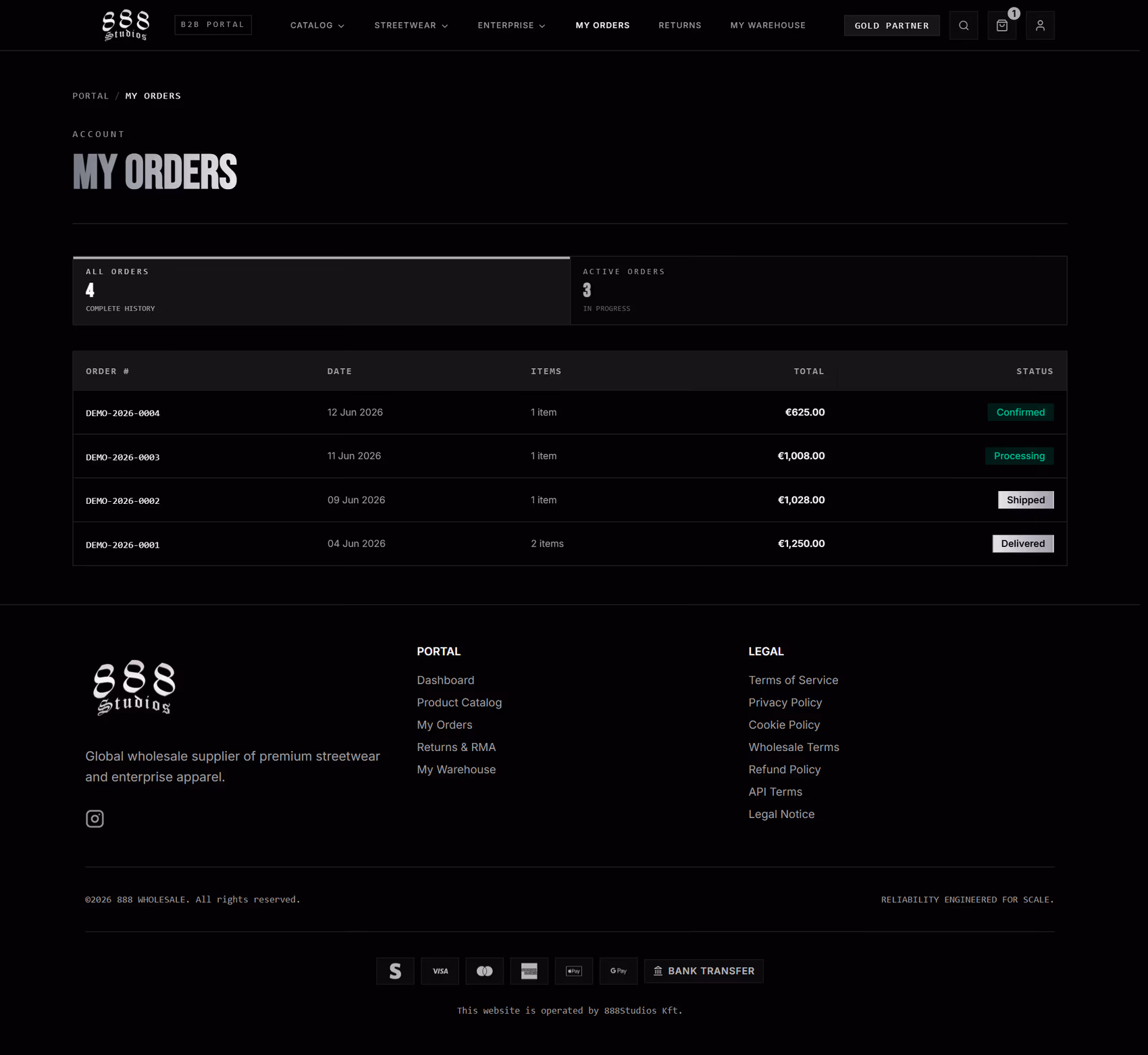888 Wholesale portal order history list with status badges for confirmed, processing, shipped, and delivered orders